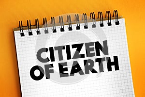 Citizen of Earth text on notepad, concept background