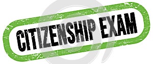 CITIZENSHIP EXAM, text written on green-black stamp sign