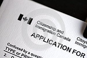 Citizenship and Immigration Canada inscription and small canadian flag