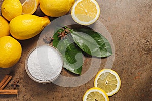 Citric acid and Lemons on the wooden backgrounde.