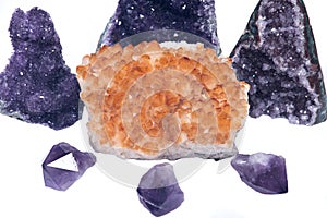 Citrine druzy cluster surrounded by amethyst druzy clusters and points