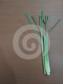 Citronella leaf on brown table