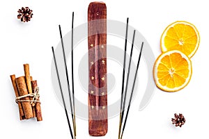 Citrus and cinnamon fragrance diffuser for air freshness on white background top view