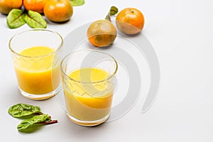 Citrus fruit juice in glasses