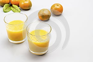 Citrus fruit juice in glasses