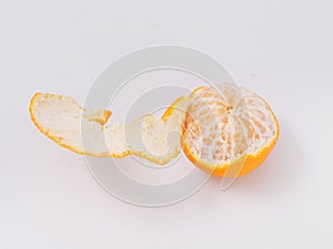 Citrus fruit mandarin orange on white background with zest photo