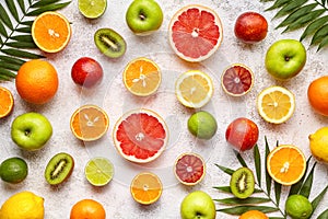 Citrus fruits background mix flat lay, summer healthy vegetarian food, antioxidant detox nutrition diet photo