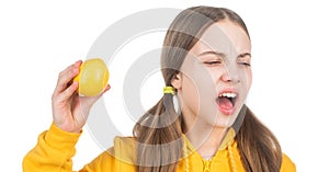 citrus fruits. organic fresh lemon. healthy life. kid facial expression. happy teen girl with lemon