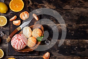 Citrus fruits on a wooden background