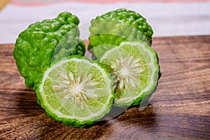 Citrus hystrix, kaffir lime or makrut lime, citrus fruit native to tropical Southeast Asia. Fruit and leaves used in Southeast
