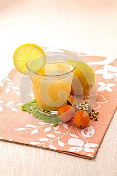 Citrus lemon barley water served in a glass isolated on napkin side view of hong kong food