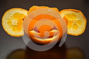 Citrus Orange Fruit Carved As A Pumpkin Face