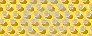 Citrus seamless backdrop texture on yellow background, hard light, top view. Continous pattern, isolate, flat lay, minimal