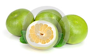 Citrus Sweetie or Pomelit, oroblanco with half and leaf on white background close-up