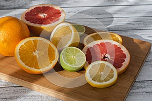 Citruses on a wooden board