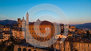 Citta Alta - Bergamo, Italy. Drone aerial view of the old town during sunrise. Landscape at the city center, its