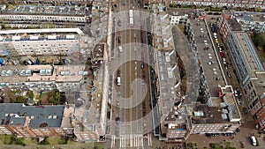 City aerial view over Amsterdam, The Netherlands. View on a Usual Living District with traffic and channel