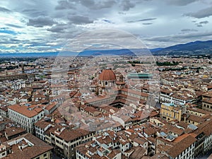 City architecture in aerial view with Medici chapel, Santa Maria Novella basilica and station, Florence ITALY