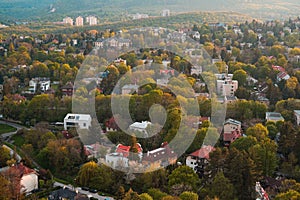 City in Autumn with red sunset light effect backgrounds, city in the mountains