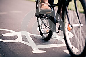 City bicycle riding on bike path