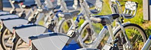 City bike parking. Bicycles for rent on city BANNER, LONG FORMAT