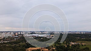 City block. Modern multi-storey buildings in the private sector. Flying at dusk at sunset. Aerial photography