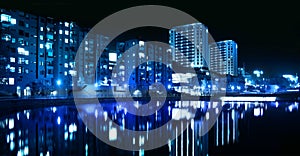 City blue nightline by the water