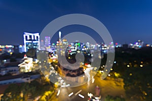 City blurring lights abstract circular bokeh on blue background