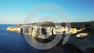 The city of Bonifacio above the chalk cliffs in the green countryside