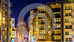 City buildings and apartments lighted by night, Architecture of Blankenberge, Belgium
