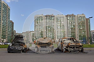 City burned cars after a fire in one of the city`s districts