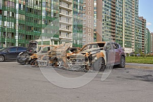 City burned cars after a fire in one of the city`s districts