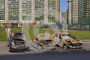 City burned cars after a fire in one of the city`s districts