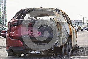 City burned cars after a fire in one of the city`s districts