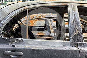 City burned cars after a fire in one of the city`s districts