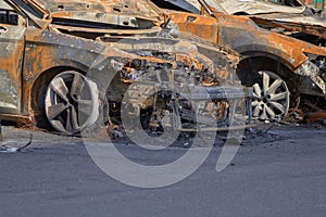 City burned cars after a fire in one of the city`s districts