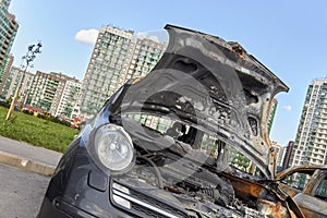 City burned cars after a fire in one of the city`s districts