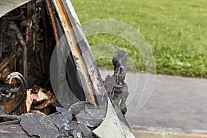 City burned cars after a fire in one of the city`s districts