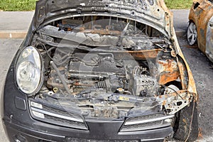 City burned cars after a fire in one of the city`s districts