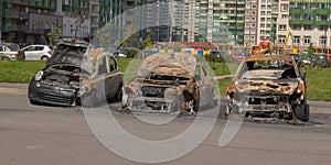 City burned cars after a fire in one of the city`s districts