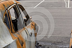 City burned cars after a fire in one of the city`s districts