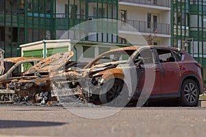 City burned cars after a fire in one of the city`s districts