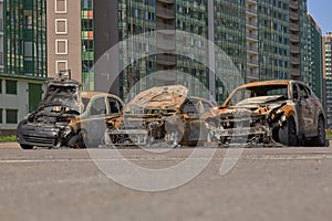 city burned cars after a fire in one of the city`s districts