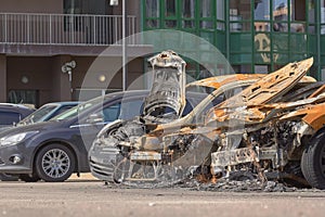 city burned cars after a fire in one of the city`s districts