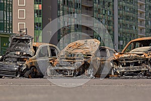 city burned cars after a fire in one of the city`s districts