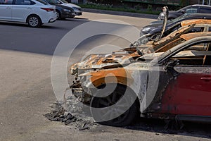 city burned cars after a fire in one of the city`s districts