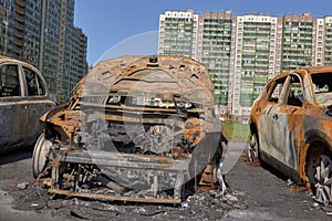 City burned cars after a fire in one of the city`s districts