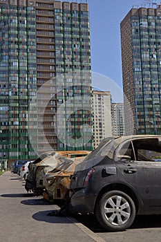 City burned cars after a fire in one of the city`s districts