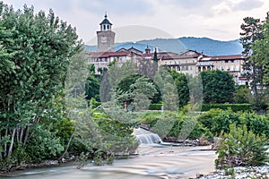 Panoramas of the city of Busca during sunset and in the blue hour photo