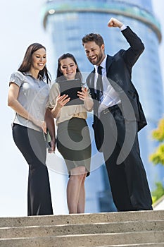 City Business Man Woman Team Using Tablet Computer